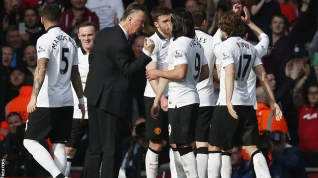 Manchester United celebrate at the full time whistle