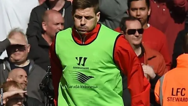 Steven Gerrard warms up