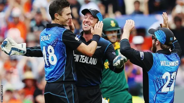 Trent Boult of New Zealand celebrates the wicket of Quinton de Kock of South Africa during the 2015 Cricket World Cup Semi Final match between New Zealand and South Africa at Eden Park