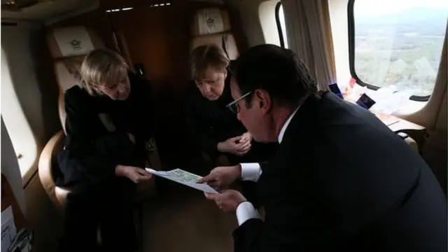 Hannelore Kraft, Angela Merkel, Francois Hollande in plane overflying crash area (25 March 2015)