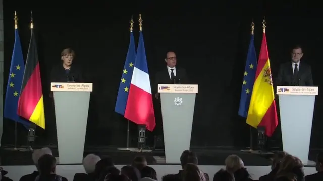 Chancellor Merkel, President Hollande and Spanish Prime Minister Mariano Rajoy at the news conference on Wednesday afternoon.