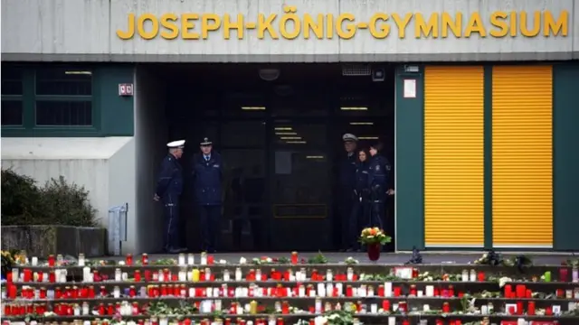 A memorial of flowers and candles can be seen in front of the Joseph-Koenig-Gymnasium secondary school in Haltern am See on 25 March, 2015