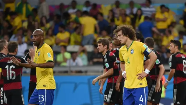 Brazil look dejected as Germany celebrate