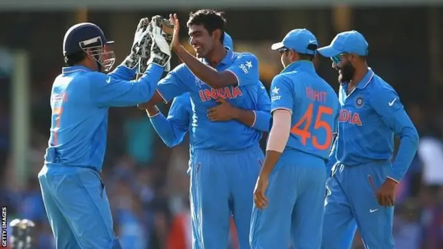 Ravichandran Ashwin of India is congratulated