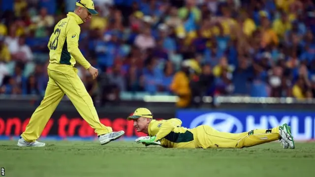 Shane Watson and Michael Clarke of Australia look on during the 2015 Cricket World Cup Semi Final match between Australia and India