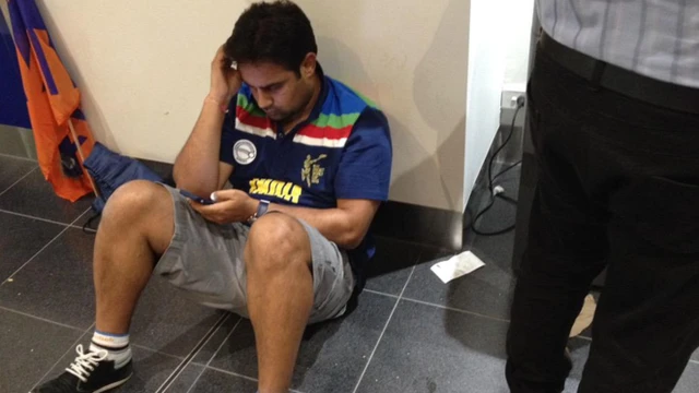 A dejected India fan