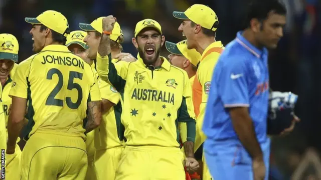 Glenn Maxwell of Australia celebrates after Mitchell Starc of Australia took the wicket of Ajinkya Rahane of India during the 2015 Cricket World Cup Semi Final match between Australia and India