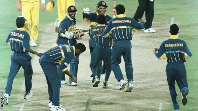 Sri Lanka captain Arjuna Ranatunga celebrates with his team after winning the Cricket World Cup Final