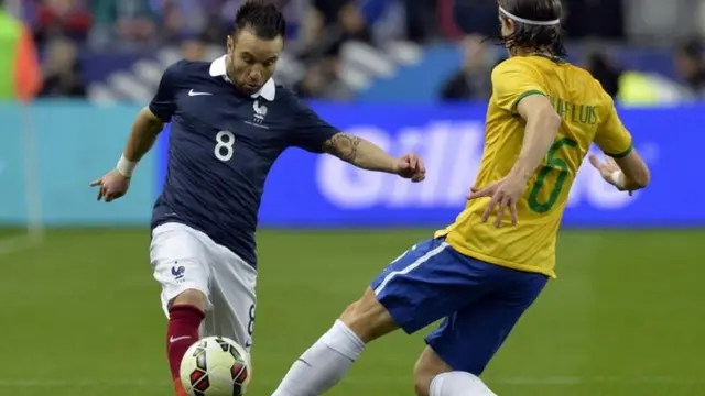 Mathieu Valbuena (left) in action for France