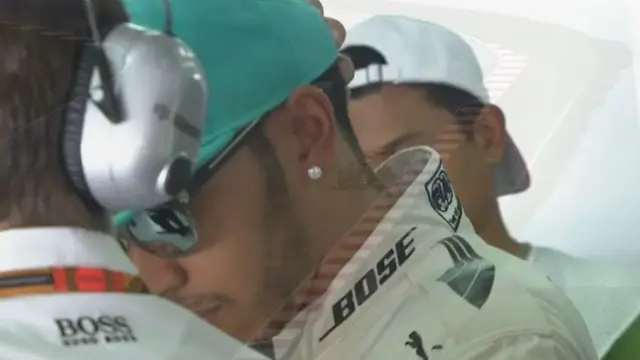 Lewis Hamilton looking unhappy in the pits