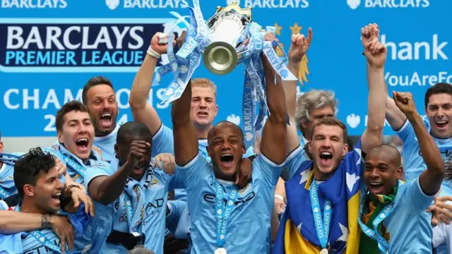 Manchester City lift Premier League trophy