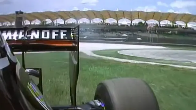 Sergio Perez in the grass