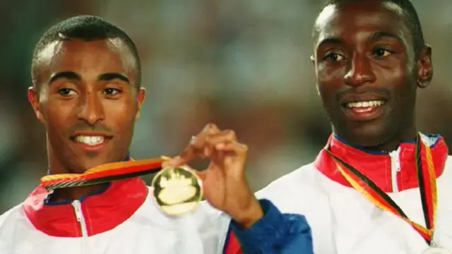 Colin Jackson (left)