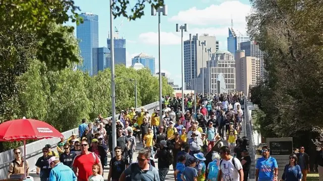 Fans walk to the MCG