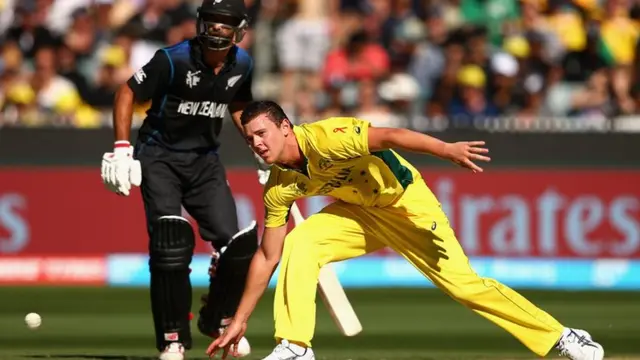 Josh Hazlewood fields off his bowling