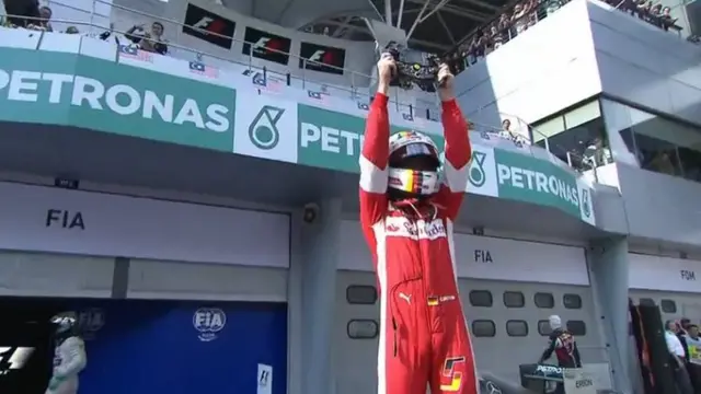 Vettel celebrates Malaysian GP win