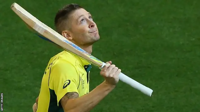 Michael Clarke walks after being dismissed by Matt Henry