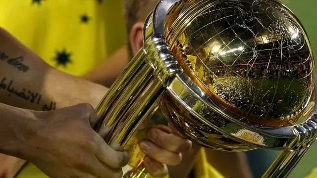 Captain Michael Clarke holds the Cricket World Cup trophy