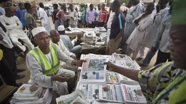 Newspaper sellers in Kano