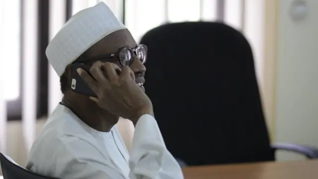 Gen Buhari on the phone