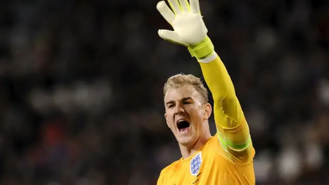 Joe Hart reacts after making a save