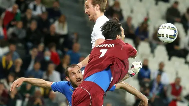 Harry Kane challenges for a corner