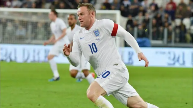 Wayne Rooney heads towards goal