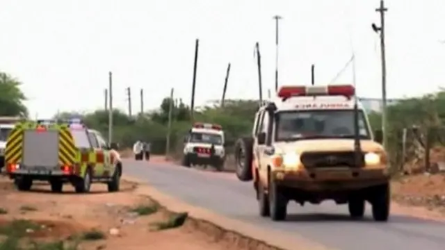 Emergency vehicles are seen parked along a road in Garissa, in this still image taken from video shot on 2 April 2015