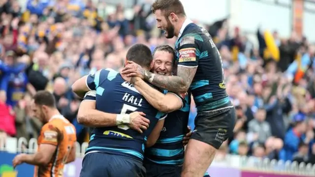 Leeds celebrate their second try of the afternoon at The Jungle, scored by winger Ryan Hall