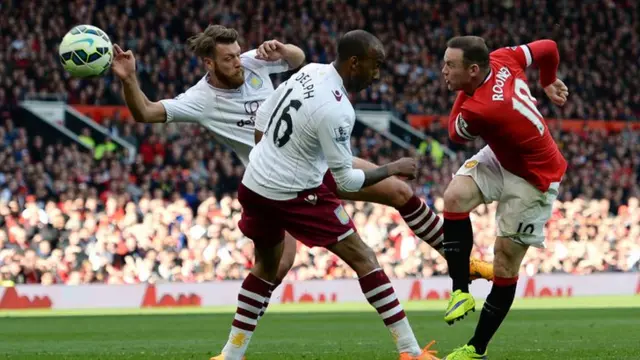 Wayne Rooney shoots and scores