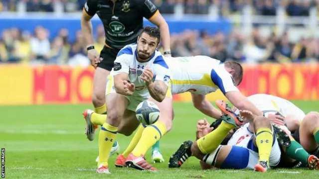 Ludovic Radosavljevic of Clermont Auvergne passes the ball