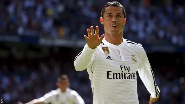 Ronaldo celebrates scoring another against Granada