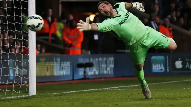 Julian Speroni dives but cannot make the save