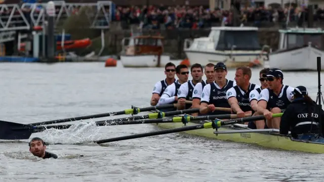 The Oxford crew look on as protester Trenton Oldfield disrupts the Boat Race