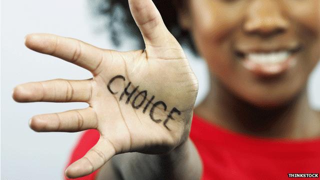 Woman with "choice" written on hand