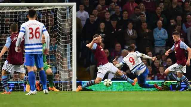 Charlie Austin scores his side's third goal of the match