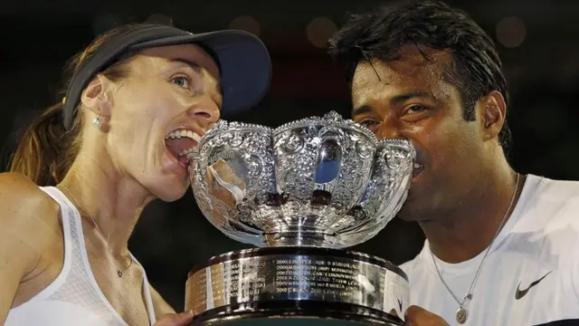 Martina Hingis (left) and Leander Paes celebrate winning the Australian Open 2015 mixed doubles title