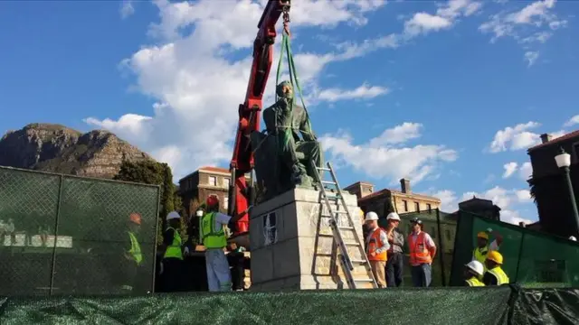 wokers prepare to remove the statue of Cecil Rhodes at the University of Cape Town