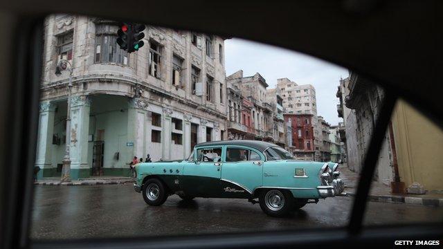 Old car as seen through the window of another