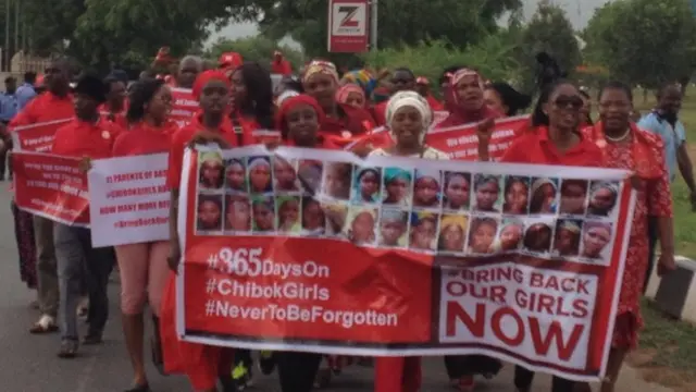 campaigners in Abja walk in honour of the girls kidnapped by Boko Haram in April last year