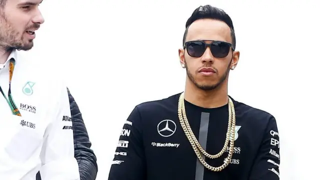 Mercedes driver Lewis Hamilton arrives in China