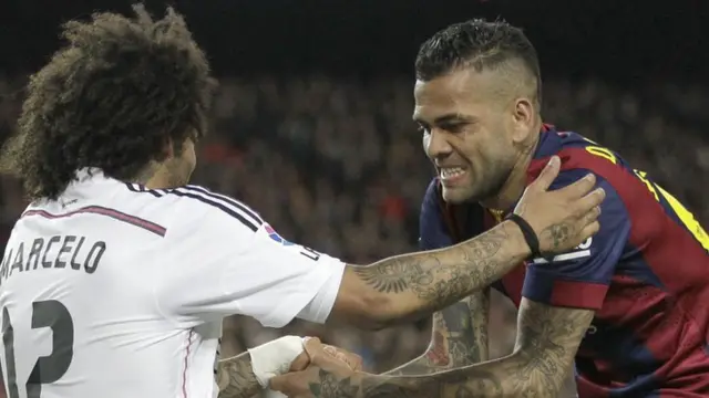 Barcelona defender Dani Alves (right)