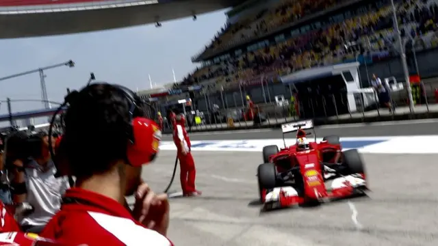 Sebastian Vettel heads into the pits