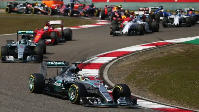 Lewis Hamilton leads through the first two corners