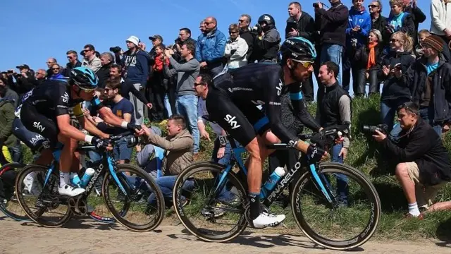 Luke Rowe and Sir Bradley Wiggins of Great Britain