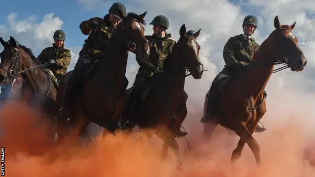 Cowboys on horseback