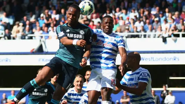 Didier Drogba with a header towards goal