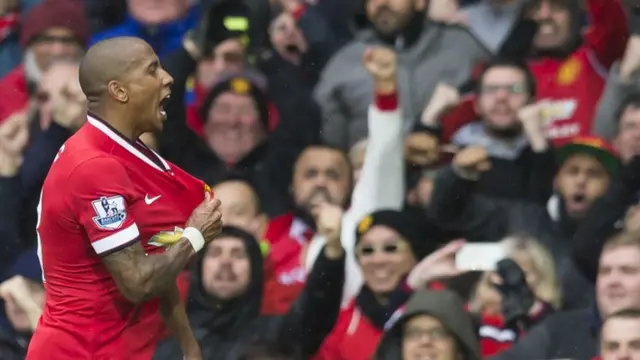 Ashley Young celebrates his goal against Manchester City