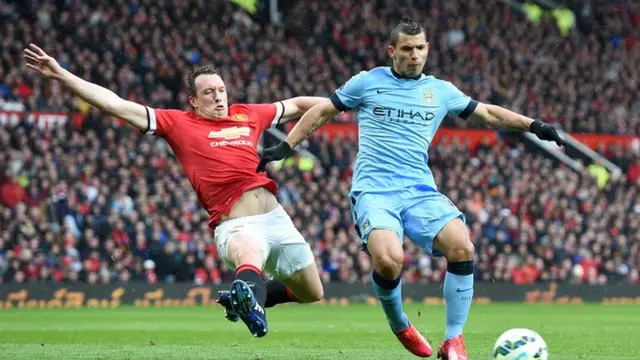 Sergio Aguero turns Phil Jones