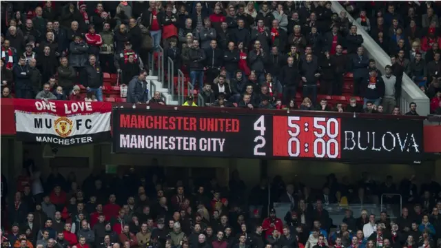 Old Trafford scoreboard